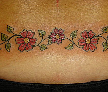 Daisy Flower Tat On Lower Back